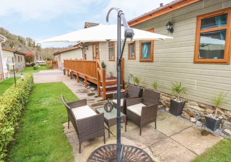 The patio & garden at Heddwch, Heritage Park, Stepaside