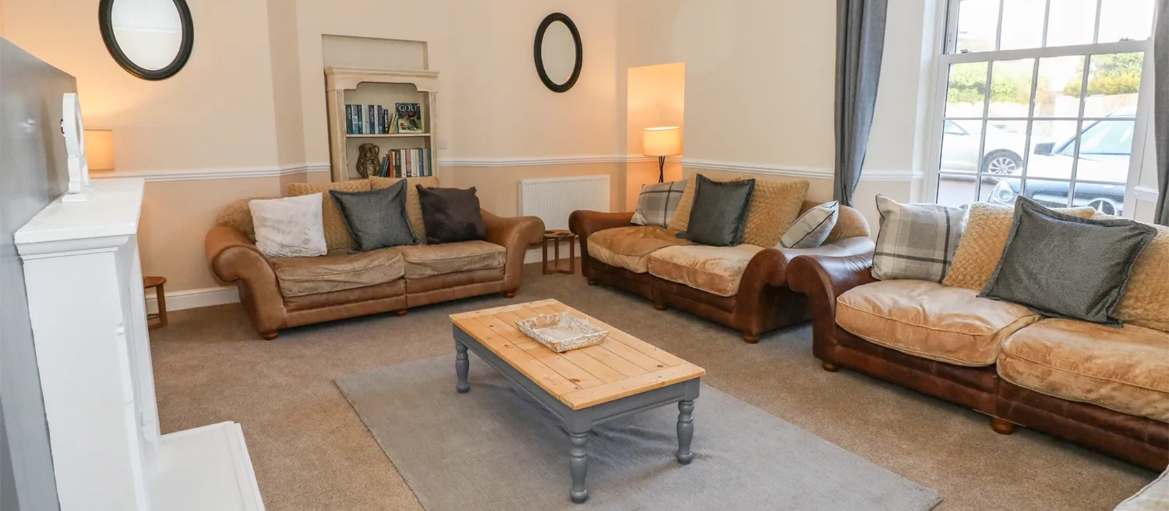 Hideaway House at The Hideaway, Tenby, is a spacious, stylish property perfect for a large party. The three-story house has five bedrooms, four bathrooms, a state-of-the-art kitchen, elegant living room, snug, games room, courtyard and parking.