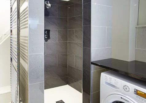 The utility / wet room & shower at High House, Tenby