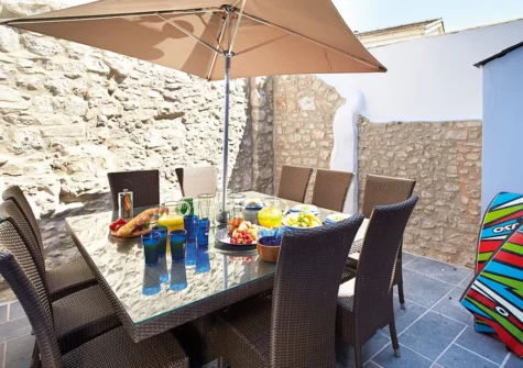 The courtyard, alfresco dining & barbecue area at High House, Tenby