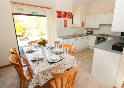 The dining area at Hill Top Farm Cottage, Cross Hands