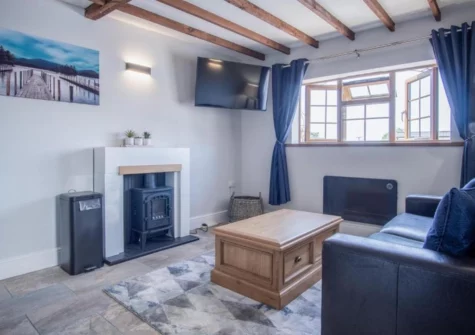 The living area at Honeysuckle Cottage, Amroth