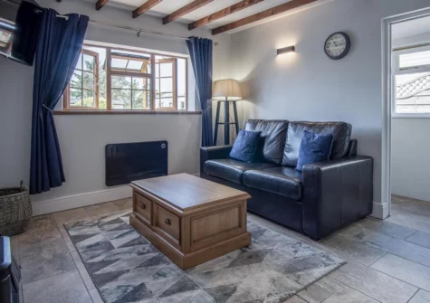 The living area at Honeysuckle Cottage, Amroth