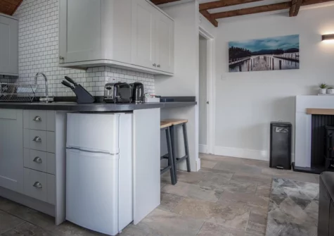 The kitchen & dining area at Honeysuckle Cottage, Amroth