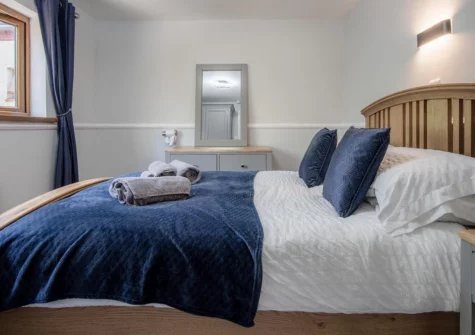 The bedroom at Honeysuckle Cottage, Amroth