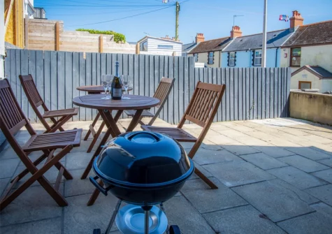 The patio, barbecue & alfresco dining area at Ivy Cellar, Tenby