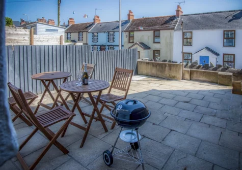 The patio, barbecue & alfresco dining area at Ivy Cellar, Tenby