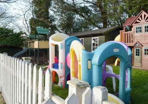 The shared children's play area at Ivy Court Cottages, Llys-Y-Fran