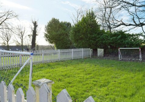 The shared children's play area at Ivy Court Cottages, Llys-Y-Fran
