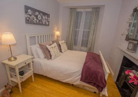 The bedroom at Lancaster Apartment, Tenby