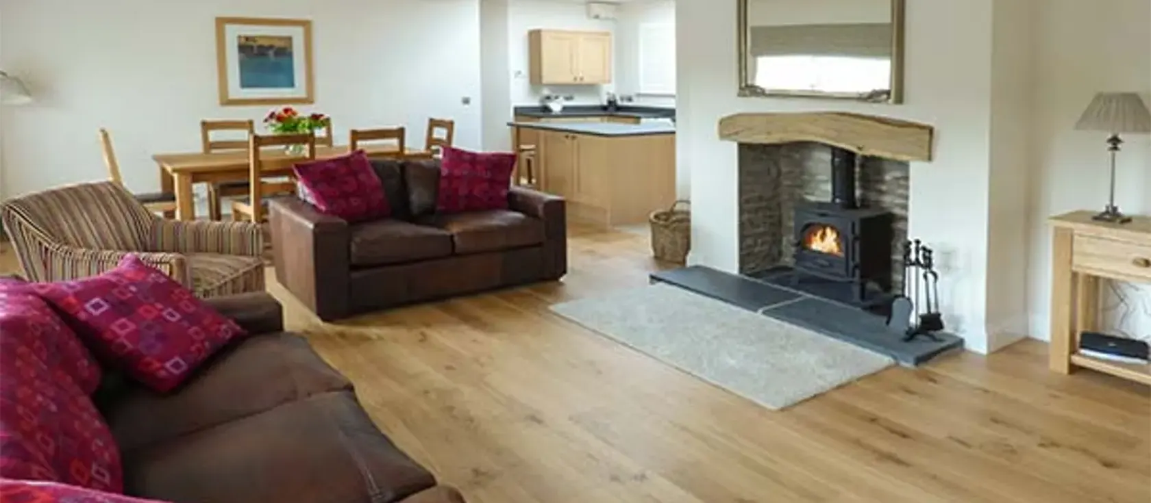 Llety'r Llwynog, Llanfallteg West is a welcoming stone cottage surrounded by rolling Welsh countryside. All on the ground floor, this spacious property has an open-plan living area with a log fire, three comfortable bedrooms, and a lovely garden.