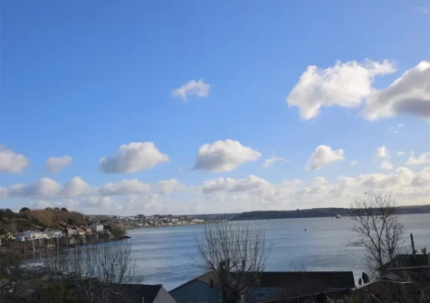 Enjoy stunning waterway views from the garden patio at Millbank Cottage, Llanstadwell