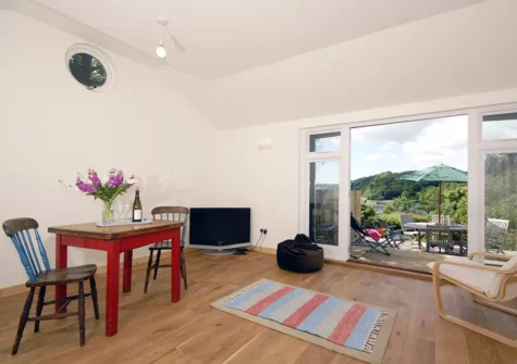 The outdoor garden room & patio at Monkstone View, Saundersfoot