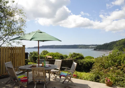 Enjoy panoramic views from the patio & alfresco dining area at Monkstone View, Saundersfoot
