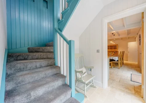Stairs to the first floor at Oak Tree House, Saundersfoot
