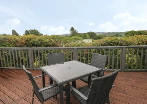The decked patio & alfresco dining area at Oakland Cottage, Wisemans Bridge