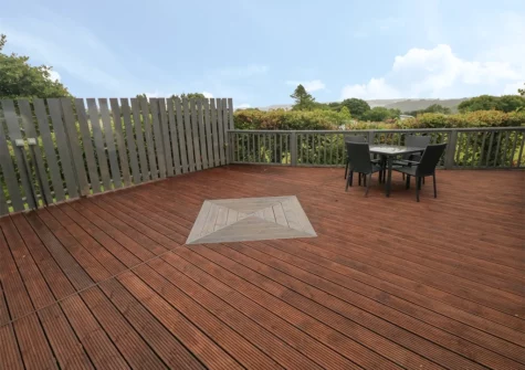 The decked patio & alfresco dining area at Oakland Cottage, Wisemans Bridge