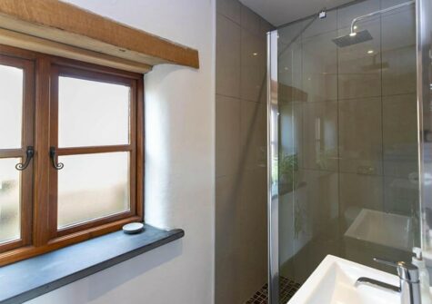 Bedroom #1 en-suite at Orchard Barn, St Florence