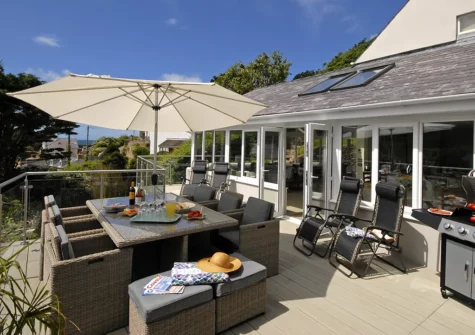 The patio, barbecue & alfresco dining area at Oswald House, Little Haven