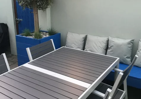 The rear patio & alfresco dining area at Pebble Cottage, Tenby