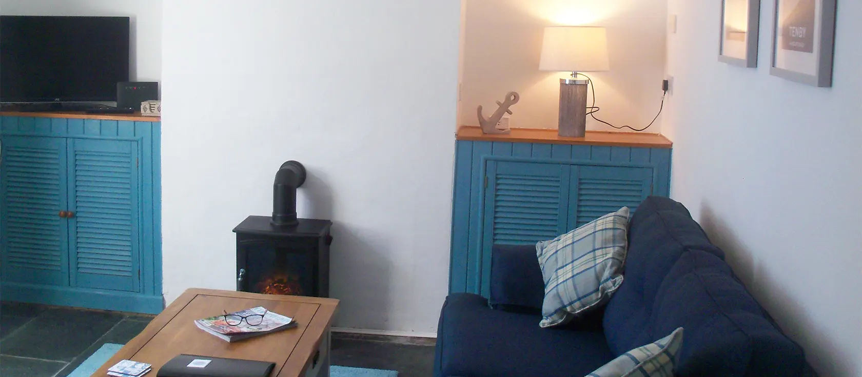 Pebble Cottage, Tenby, is a cheerful, colourful seaside cottage perfect for multigenerational family trips. Two double bedrooms and one bunk room comfortably sleep four adults and two children while the terrace is a lovely afternoon suntrap.