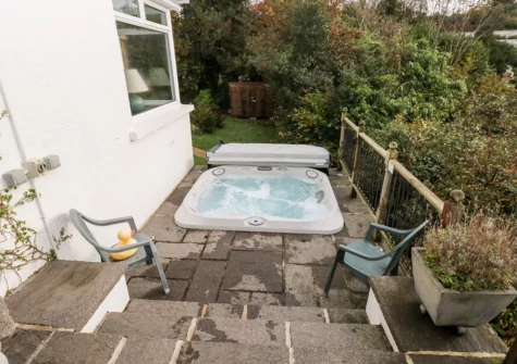 The patio & hot tub at Pen Y Daith, Stepaside