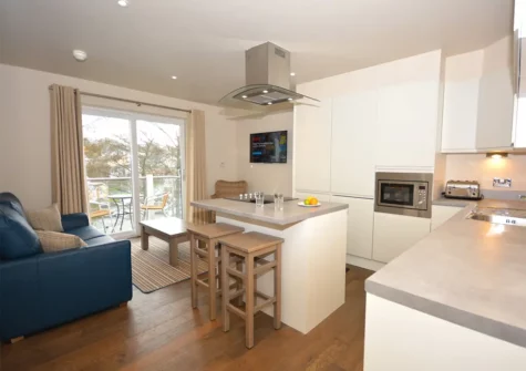 The kitchen & dining area at Petrel Apartment, Saundersfoot