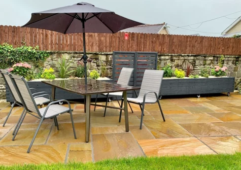 The patio & alfresco dining area at Pottery Cottage, Begelly