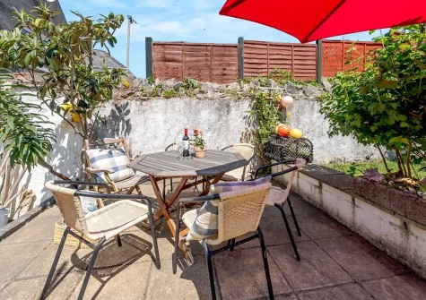 The patio & alfresco dining area at Quarry Cottages 3, Tenby