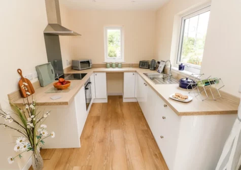 The living area at Ramsey Lodge, Bier Wood Lodges, Manorbier