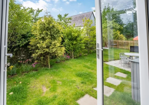 The garden at Ramsey Lodge, Bier Wood Lodges, Manorbier