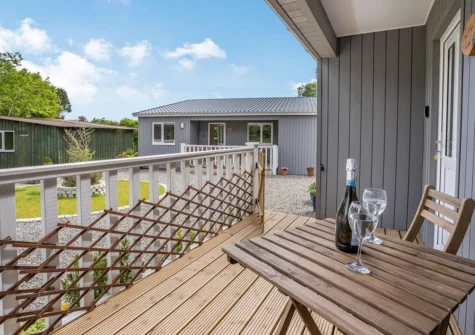 The front balcony at Ramsey Lodge, Bier Wood Lodges, Manorbier