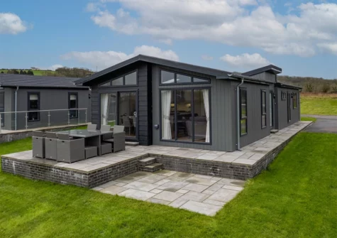 The patio, alfresco dining area & garden at Sandpiper, Tenby