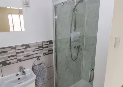 Bedroom #1 en-suite at Sandy Bay House, Saundersfoot