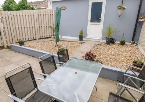 The patio & alfresco dining area at Sandy Bay House, Saundersfoot