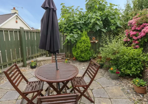 The patio & alfresco dining area at Sandyhill House, Saundersfoot