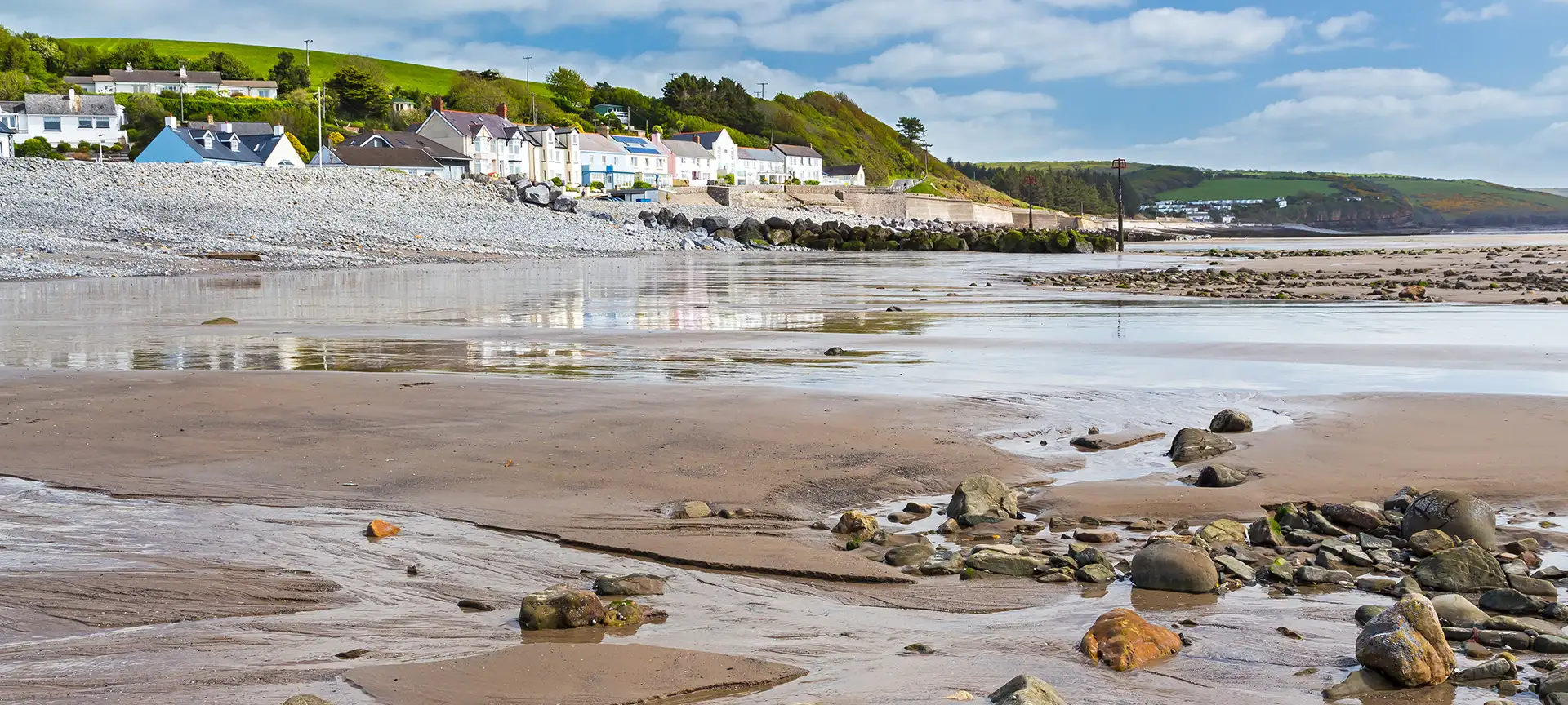 The golden sand, Blue Flag beach at Amroth sits at the start / end of the 186 mile Pembrokeshire coastal path - it's an ideal family beach, and something of a hidden gem! As the tide goes out a vast expanse of sand is revealed - perfect for beach games. When the tide comes in the beach is greatly reduced in size and is mostly pebble above the shoreline.
