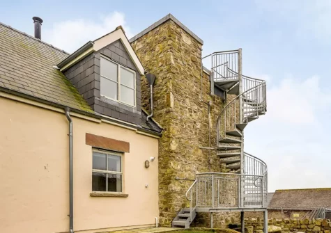 Climb the stairs to the sun deck at Seaesta Cottage, Broad Haven
