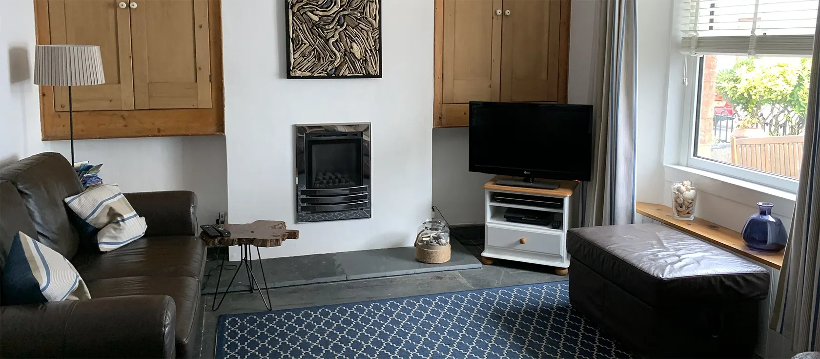 Seasalt Cottage, Tenby is a traditional Welsh cottage skillfully refurbished to showcase original features alongside modern comforts. It has a sunny courtyard and outdoor seating at the front and back and is a short walk from Tenby's best beaches.