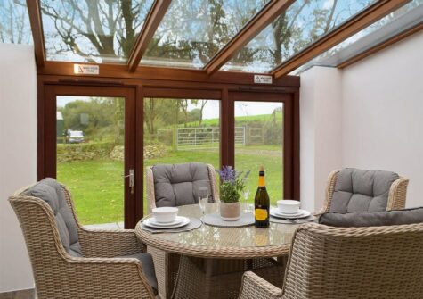 The dining area at Snowdrop Cottage, Penfeidr Cottages, Glanrhyd