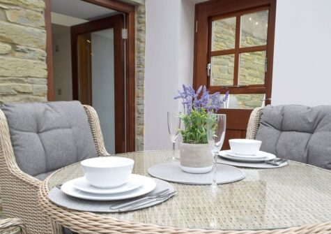 The dining area at Snowdrop Cottage, Penfeidr Cottages, Glanrhyd