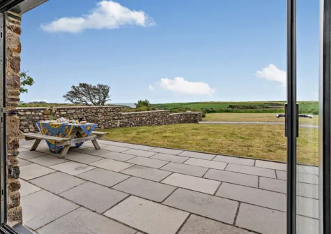 The patio & alfresco dining area at St Davids Bijou Retreat, Porthclais