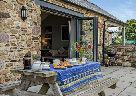 The patio & alfresco dining area at St Davids Corner House, Porthclais