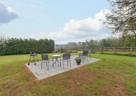 The shared garden & barbecue area at Star Cottage, Pentlepoir