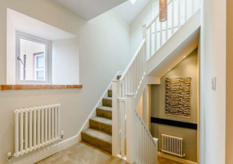 The stairway to the second & third floors at Summers, Tenby