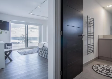 Bedroom #1 & en-suite at Sunrise, Pendine