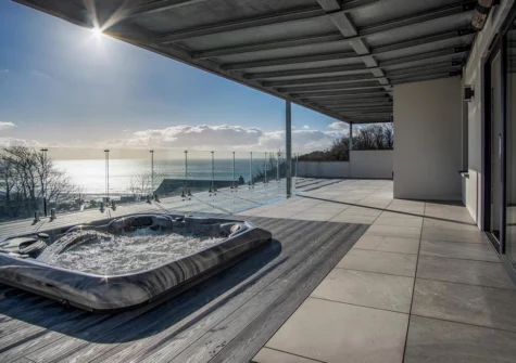 The hot tub & lower patio at Sunrise, Pendine