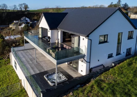 The upper & lower patios and garden at Sunrise, Pendine