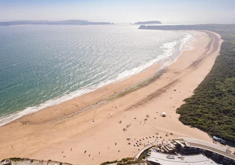 Tenby's South Beach is a long, dune backed, beach popular with families