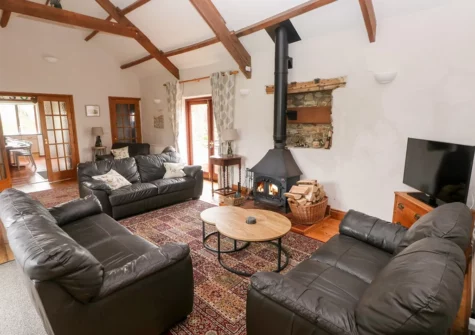 The living room at The Barn at Harrolds Farm, Redberth